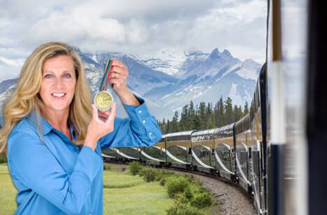 An image of the Rocky Mountaineer train against the backdrop of Canada