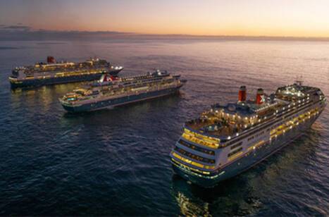 Three cruise ships at sea