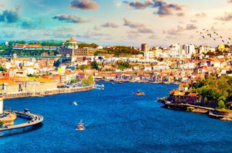 A panoramic view of the Douro River running through Porto