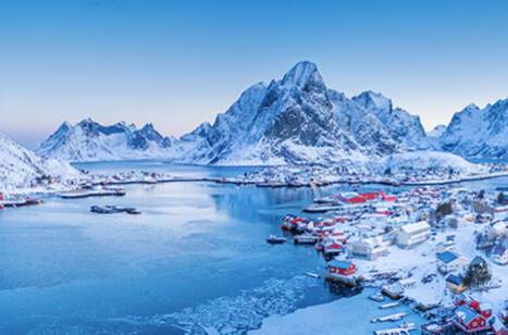 An aerial view of snowy Reine