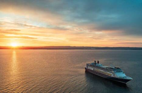 Panoramic image of Borealis at sea during sunset