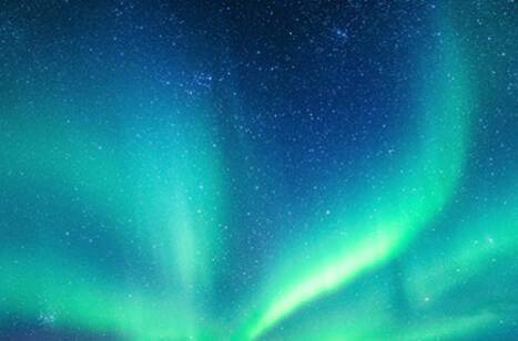 The northern lights dancing across the night sky