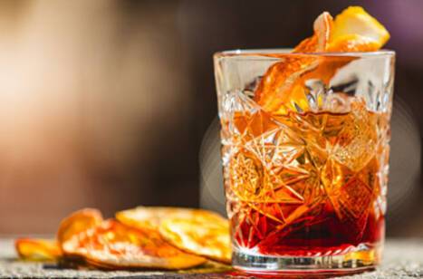Close-up image of an Old Fashioned cocktail