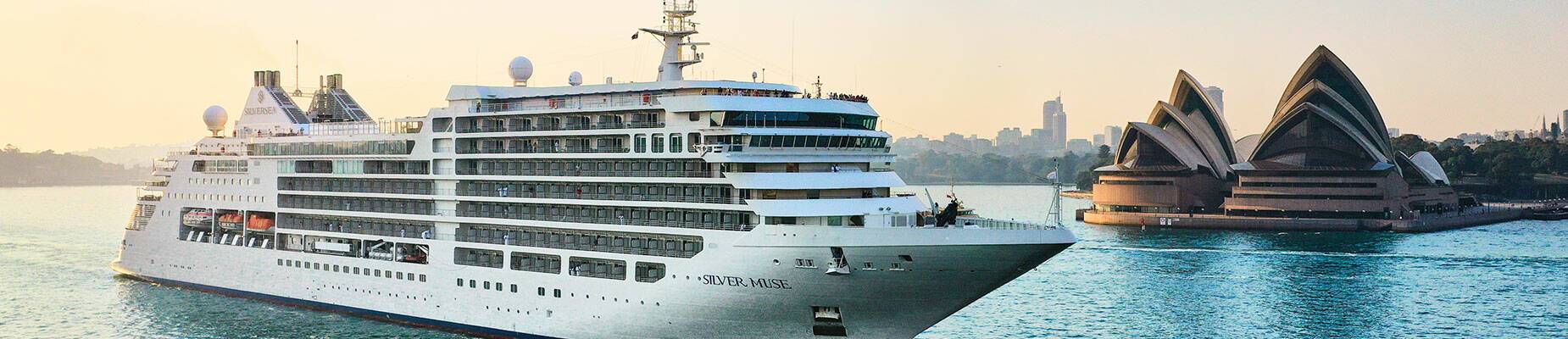 A cruise ship in front of the Sydney Opera House