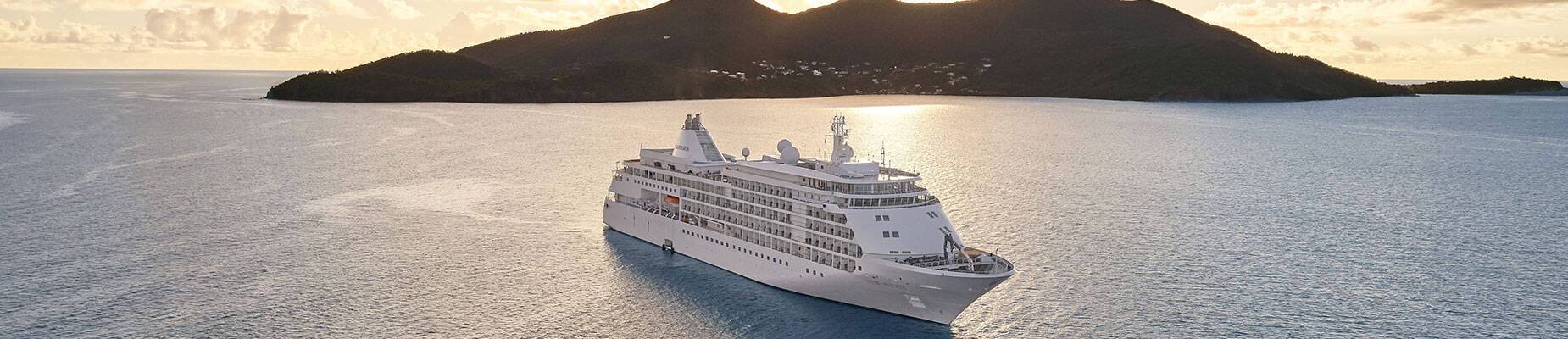 Silver Ray sailing at sunset