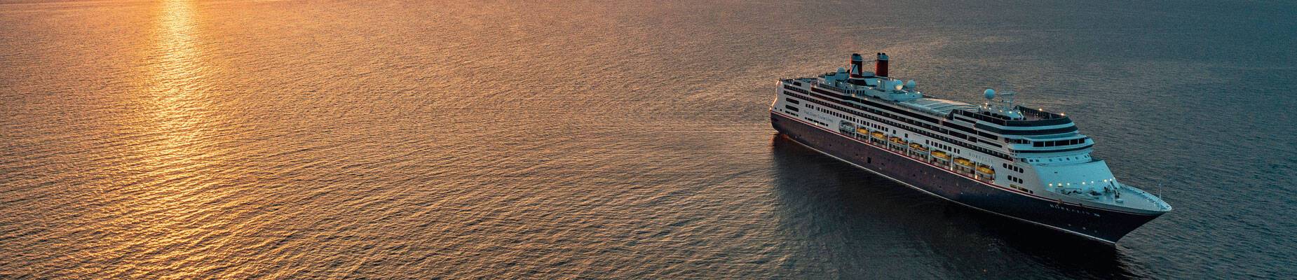 Panoramic image of Borealis at sea during sunset