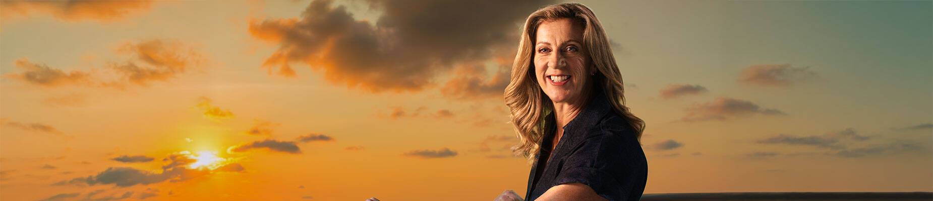 Sally Gunnell on a ship at sunset
