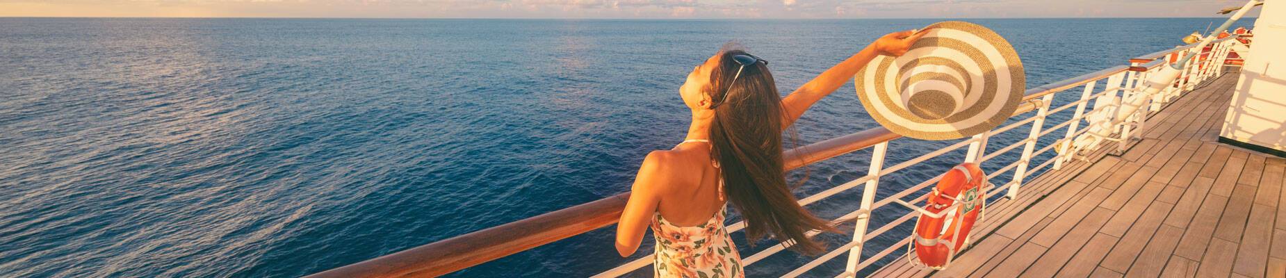 A happy solo cruiser watching the sunset from deck