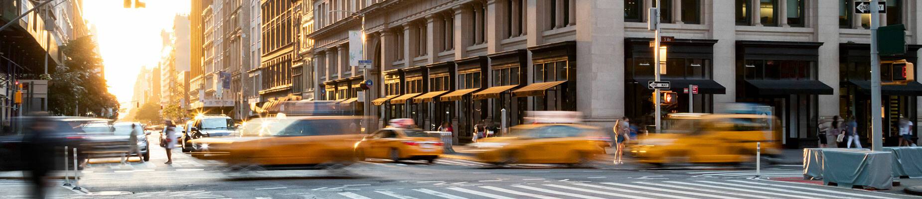 Yellow cabs travelling through New York