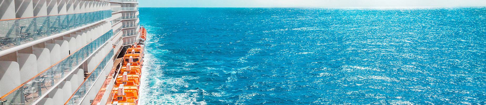 The side of a cruise ship at sea