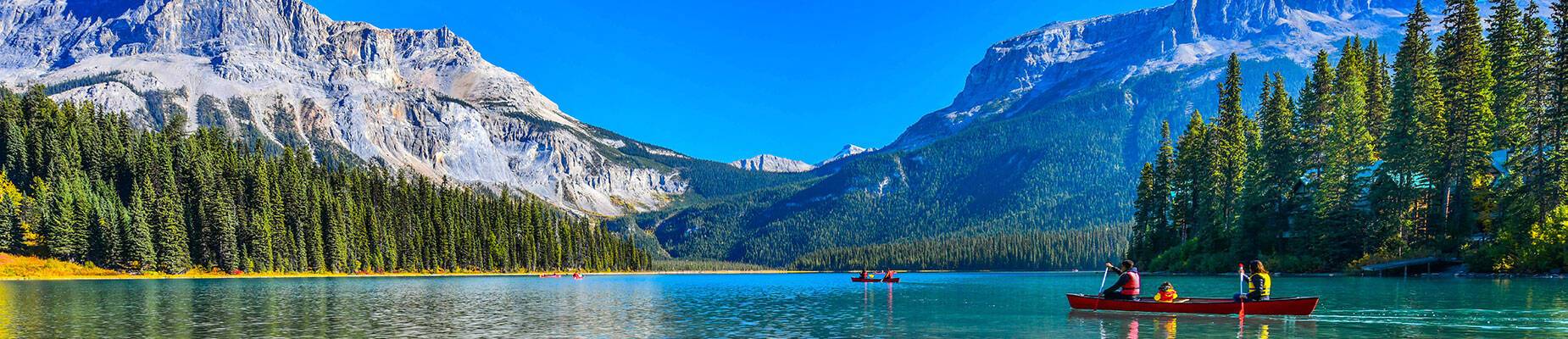 A panoramic view of Banff National Park from the water