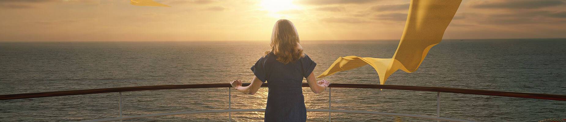 Sally Gunnell standing at the bow of a ship