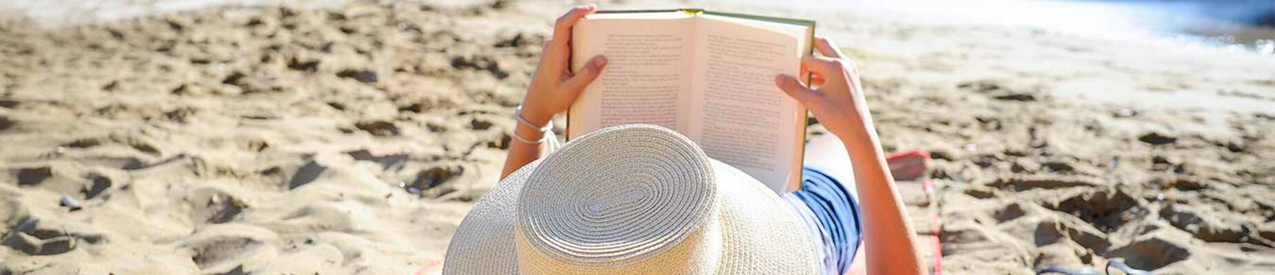 Woman reading on the beach