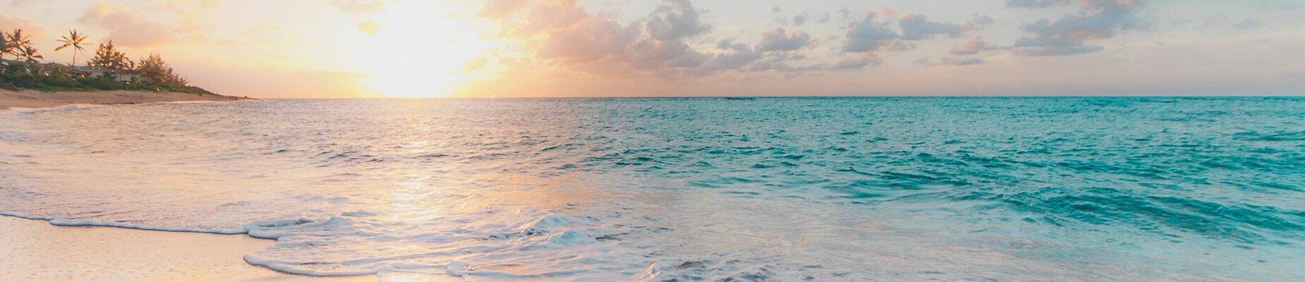 View of the sunsetting over the sea from a beach