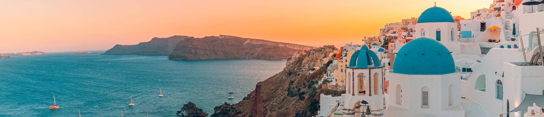 Panoramic image of Santorini at sunset