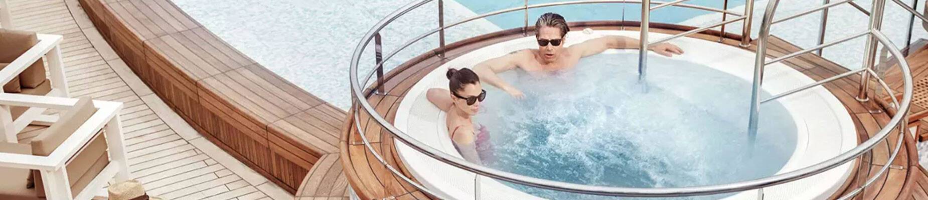 A couple relaxing in a cruise ship hot tub
