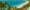 A panoramic view of a beach in Port Douglas