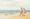 Couple walking hand in hand on the beach