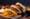 Three arepas on a platter