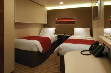 Family Inside Stateroom, Norwegian Breakaway