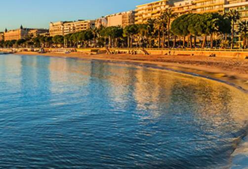A panoramic view of Cannes at sunset