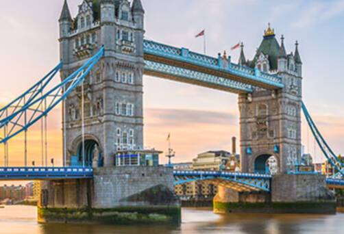 A panoramic view of Tower Bridge at sunrise