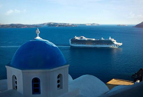 Emerald Princess sailing past Santorini
