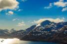 A panoramic view of boats passing through Dutch Harbor