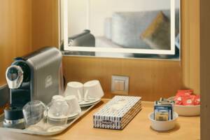 De Luxe Suite Living Area. Ambition, Ambassador Cruise Line