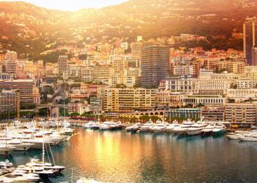 The sun setting over Monte Carlo's harbour