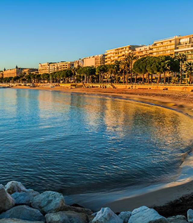 A panoramic view of Cannes at sunset