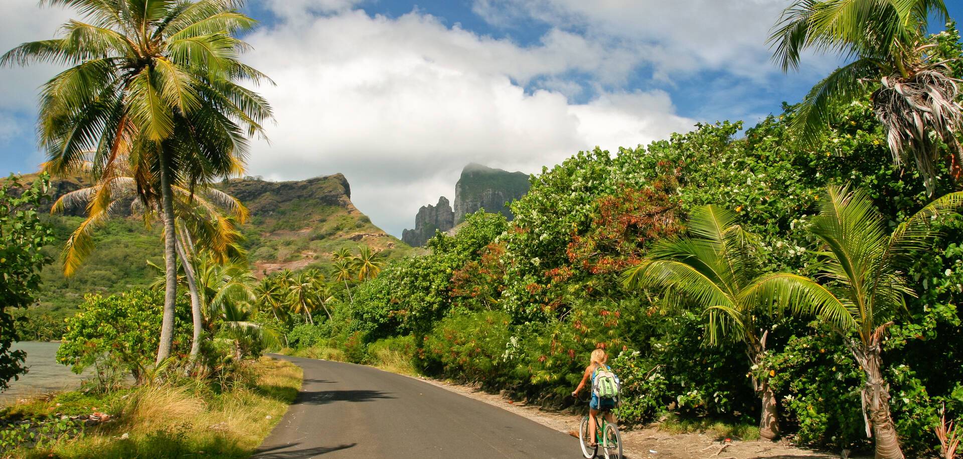 Girl on bicycle, Bora Bora