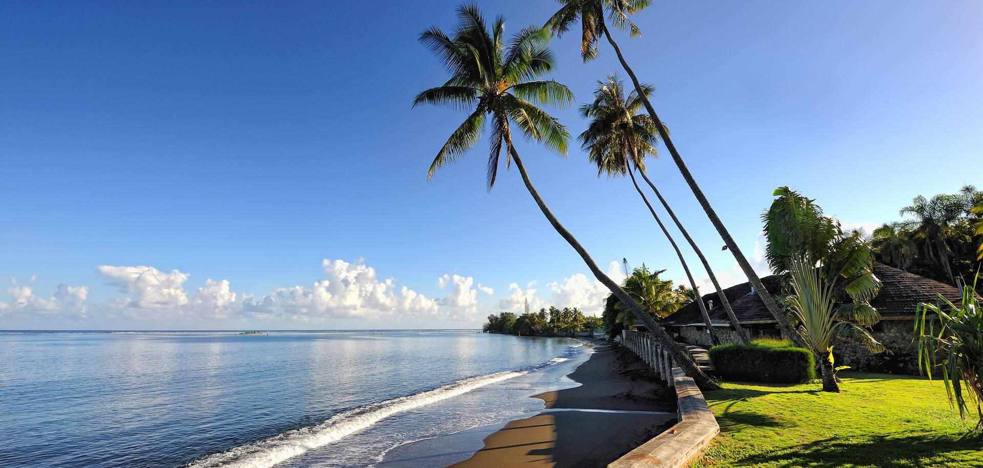 Black sand beach, Pirae, Papeete,Tahiti island, French Polynesia