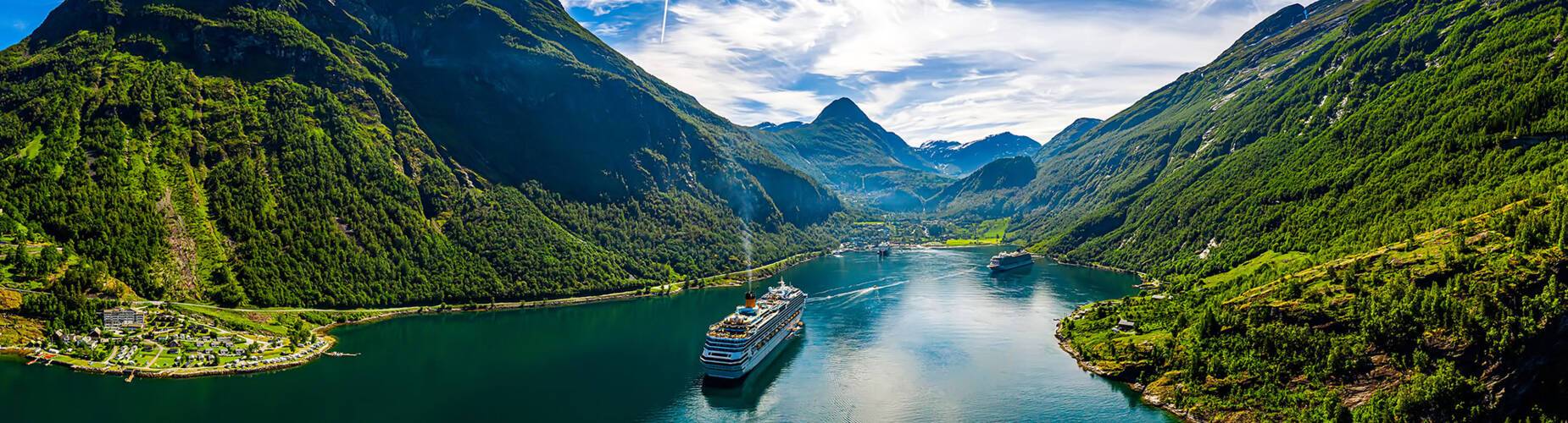 Cruise ships sailing in and out of Geirangerfjord