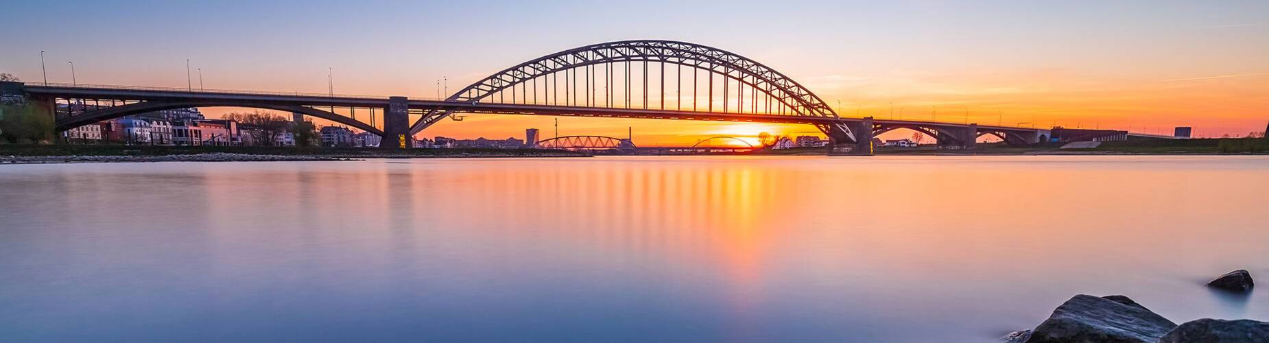 The sun setting over the three bridges of Nijmegen