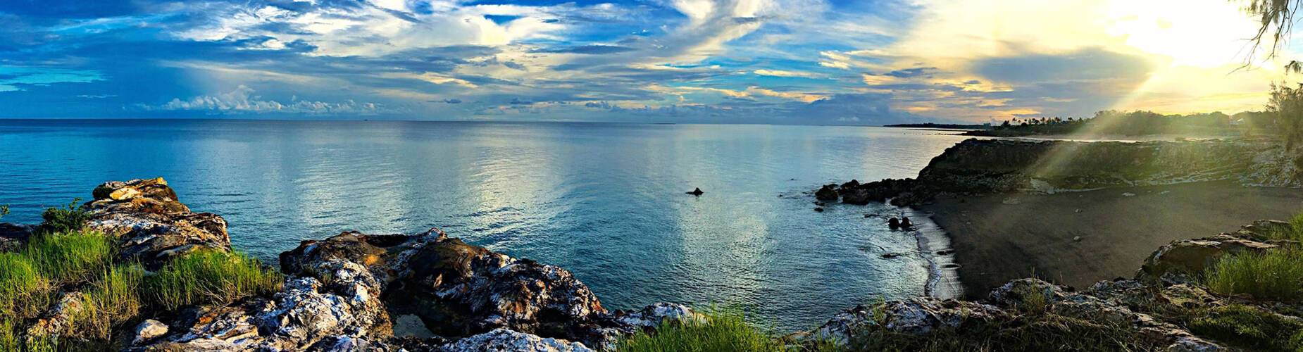 A panoramic view of sunrise at Nightcliff in Darwin