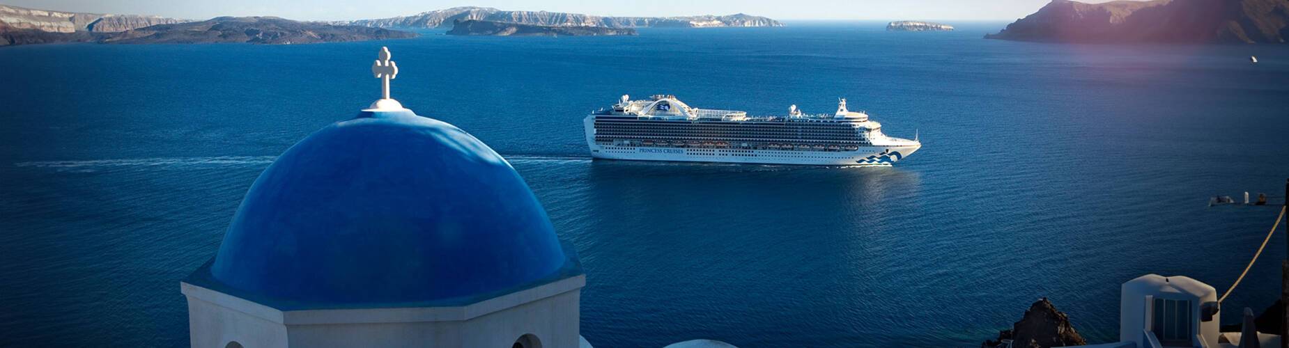 Emerald Princess sailing past Santorini