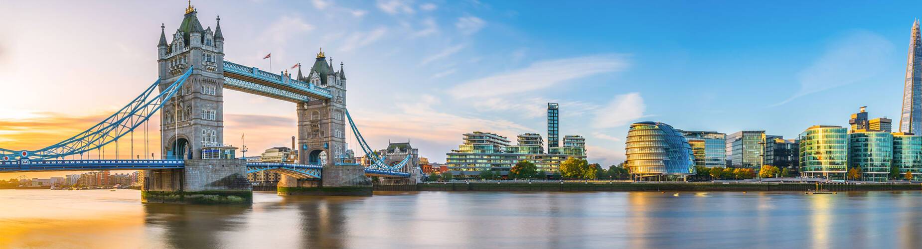 A panoramic view of Tower Bridge at sunrise