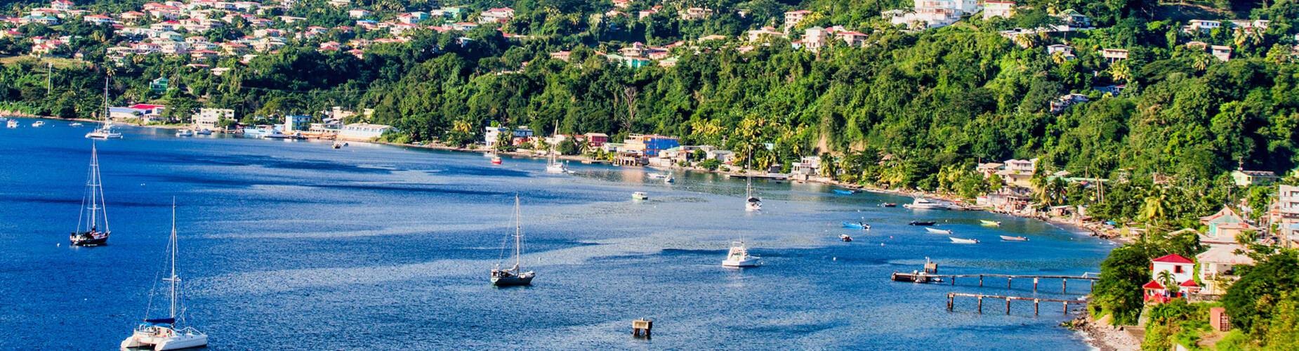 The blue waters and green hills of Dominica